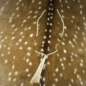 Beaded necklace with tassel